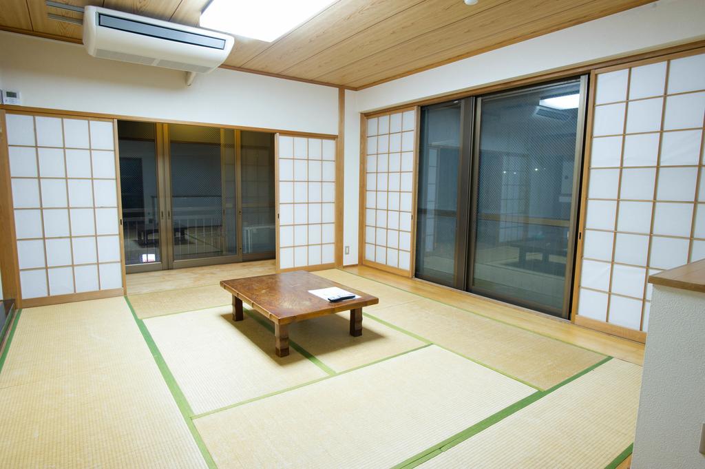 Hotel 駅前山小屋a-Yard à Ome Extérieur photo